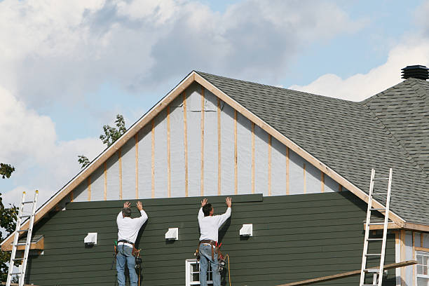 Professional Emergency Siding Repair technician working in Carlton, PA